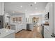 Modern kitchen featuring stainless steel appliances, granite countertops, and an adjacent dining area at 1016 Saluda River Rd., Myrtle Beach, SC 29588