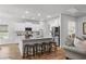 Spacious kitchen with stainless steel appliances, a large island with bar seating, and white cabinetry at 1016 Saluda River Rd., Myrtle Beach, SC 29588
