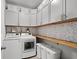 Well-organized laundry room with lots of storage at 1016 Saluda River Rd., Myrtle Beach, SC 29588