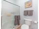 Clean and functional bathroom with a shower featuring glass doors and neutral-colored fixtures, ensuring a practical space at 126 Ella Kinley Circle # 401, Myrtle Beach, SC 29588