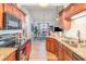 Charming kitchen boasts granite countertops and stainless steel appliances, seamlessly flowing into the dining area at 126 Ella Kinley Circle # 401, Myrtle Beach, SC 29588