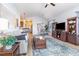 Well-lit living room with a cohesive design, comfortable seating, and open access to the kitchen and dining areas at 126 Ella Kinley Circle # 401, Myrtle Beach, SC 29588