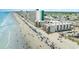 Beautiful aerial view of beachfront resort with condos, pool, and beach access, perfect for vacation rentals at 1310 N Waccamaw Dr. # 211, Garden City Beach, SC 29576