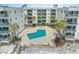 Expansive aerial view of the complex, showcasing the pool, beach access, and beautiful surrounding landscape at 1310 N Waccamaw Dr. # 211, Garden City Beach, SC 29576