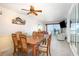 A view from the dining area through to the living room and ocean view balcony at 1310 N Waccamaw Dr. # 211, Garden City Beach, SC 29576