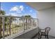 Balcony view showcasing the ocean, beach, and palm trees from Camelot By The Sea at 2000 Ocean Blvd. N # 216, Myrtle Beach, SC 29588