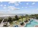 Beautiful ocean view from the Camelot By The Sea resort with pool and palm trees at 2000 Ocean Blvd. N # 216, Myrtle Beach, SC 29588