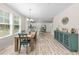 Open dining area featuring natural light, modern decor, and seamlessly connects to kitchen at 2250 Heritage Loop, Myrtle Beach, SC 29577