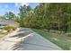 A long driveway leading up to a home with tropical plants at 2250 Heritage Loop, Myrtle Beach, SC 29577