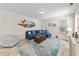 Bright living room with coastal decor, nice furnishings, and a comfortable blue sectional sofa at 2250 Heritage Loop, Myrtle Beach, SC 29577