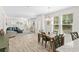 Bright and open-concept floor plan with dining and living area with lots of natural light at 2250 Heritage Loop, Myrtle Beach, SC 29577