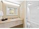 Bathroom featuring granite vanity, large mirror, and shower with tub at 3000 N Ocean Blvd. # 729, Myrtle Beach, SC 29577