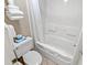 Clean bathroom featuring a toilet, tub and shower, and fresh towels at 3000 N Ocean Blvd. # 729, Myrtle Beach, SC 29577