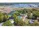 The aerial view shows proximity to the water, neighborhood, and surrounding greenery at 391 Waterford Dr., Georgetown, SC 29440