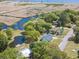 An aerial view shows proximity to the water and surrounding greenery at 391 Waterford Dr., Georgetown, SC 29440