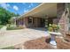 Beautiful brick home featuring a large carport and lush landscaping, perfect for outdoor living at 391 Waterford Dr., Georgetown, SC 29440