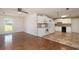 Bright eat-in kitchen with white cabinets, appliances, and contrasting floor tile at 391 Waterford Dr., Georgetown, SC 29440