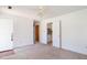 Neutral living room with open doorway to a potential kitchen area at 391 Waterford Dr., Georgetown, SC 29440