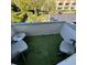 Outdoor balcony features two chairs, a mirrored table, and a peaceful view at 4701 N Kings Hwy. # 19, Myrtle Beach, SC 29579