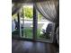 Cozy balcony with seating area, accessible through sliding glass doors, perfect for enjoying the outdoors from indoors at 4701 N Kings Hwy. # 19, Myrtle Beach, SC 29579