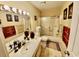 Inviting bathroom with decorative towels, framed mirror, and a shower-tub combination at 4701 N Kings Hwy. # 19, Myrtle Beach, SC 29579