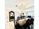 The dining room boasts a gorgeous chandelier and plenty of seating at 4701 N Kings Hwy. # 19, Myrtle Beach, SC 29579