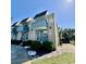 Attractive two-story condo showcasing a well-manicured lawn and blue exterior accents at 4701 N Kings Hwy. # 19, Myrtle Beach, SC 29579