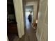 Inviting hallway featuring a friendly dog and seamless flow to the living areas at 4701 N Kings Hwy. # 19, Myrtle Beach, SC 29579