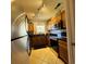 View of a well-lit kitchen featuring stainless steel appliances and granite countertops at 4701 N Kings Hwy. # 19, Myrtle Beach, SC 29579