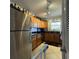Bright kitchen with stainless steel appliances, granite countertops and wooden cabinets at 4701 N Kings Hwy. # 19, Myrtle Beach, SC 29579