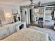 Bright bedroom has ceiling fan, vanity, and double mirror closet doors at 4701 N Kings Hwy. # 19, Myrtle Beach, SC 29579