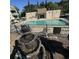 Community pool area with a fountain and secure fencing, offering residents a refreshing retreat at 4701 N Kings Hwy. # 19, Myrtle Beach, SC 29579