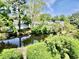 Peaceful water view with lush landscaping and nearby homes at 4701 N Kings Hwy. # 19, Myrtle Beach, SC 29579