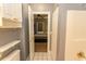 Bathroom offers tile flooring and a view into the bedroom, plus fresh paint at 4823 Orchid Way # 2-203, Myrtle Beach, SC 29577
