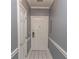 Neutral hallway offering a seamless transition throughout the condo at 4823 Orchid Way # 2-203, Myrtle Beach, SC 29577