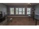 Inviting living room with ample natural light and neutral decor, perfect for relaxation and entertainment at 4823 Orchid Way # 2-203, Myrtle Beach, SC 29577