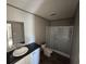 Bathroom with a shower, toilet, and sink with a vanity and black countertop at 491 N Green Sea Rd., Loris, SC 29569