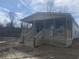 New construction home featuring a covered front porch with wooden decking and stairs at 491 N Green Sea Rd., Loris, SC 29569