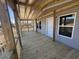 Covered porch with wood columns, decking and railings, offering an outdoor living space at 491 N Green Sea Rd., Loris, SC 29569