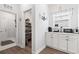 This kitchen area features white cabinets and plenty of counter space at 5000 Azul Loop, Myrtle Beach, SC 29579
