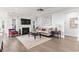 Inviting living room with a cozy fireplace, comfortable seating, and plenty of natural light at 5000 Azul Loop, Myrtle Beach, SC 29579