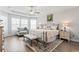 This main bedroom features a sitting area and tray ceilings at 5000 Azul Loop, Myrtle Beach, SC 29579