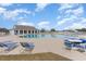 Large community pool surrounded by lounge chairs and tables, perfect for summer fun at 541 Miromar Way, Myrtle Beach, SC 29588