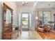Welcoming entryway with a vintage coat rack, ceramic tile, and an inviting view of the front yard at 541 Miromar Way, Myrtle Beach, SC 29588