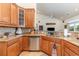 A well-equipped kitchen featuring stainless steel appliances, tile backsplash, and ample counter space for meal preparation at 541 Miromar Way, Myrtle Beach, SC 29588