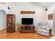 Stylish living room featuring hardwood floors, a modern entertainment center, and vaulted ceiling at 541 Miromar Way, Myrtle Beach, SC 29588
