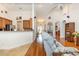 Spacious living room with an open layout, wood floors, and access to the kitchen and other areas of the home at 541 Miromar Way, Myrtle Beach, SC 29588