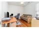 Functional home office setup with a desk, chair, futon, and ample natural light for a productive workspace at 541 Miromar Way, Myrtle Beach, SC 29588