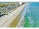 Scenic aerial beach view showing ocean waves, sandy shore, and coastal campground at 6001 - 1599 S Kings Hwy., Myrtle Beach, SC 29575