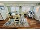Bright dining area features a glass table and seating for four, as well as lots of light at 6001 - 1599 S Kings Hwy., Myrtle Beach, SC 29575